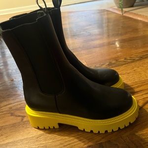 Black Combat boots with yellow sole